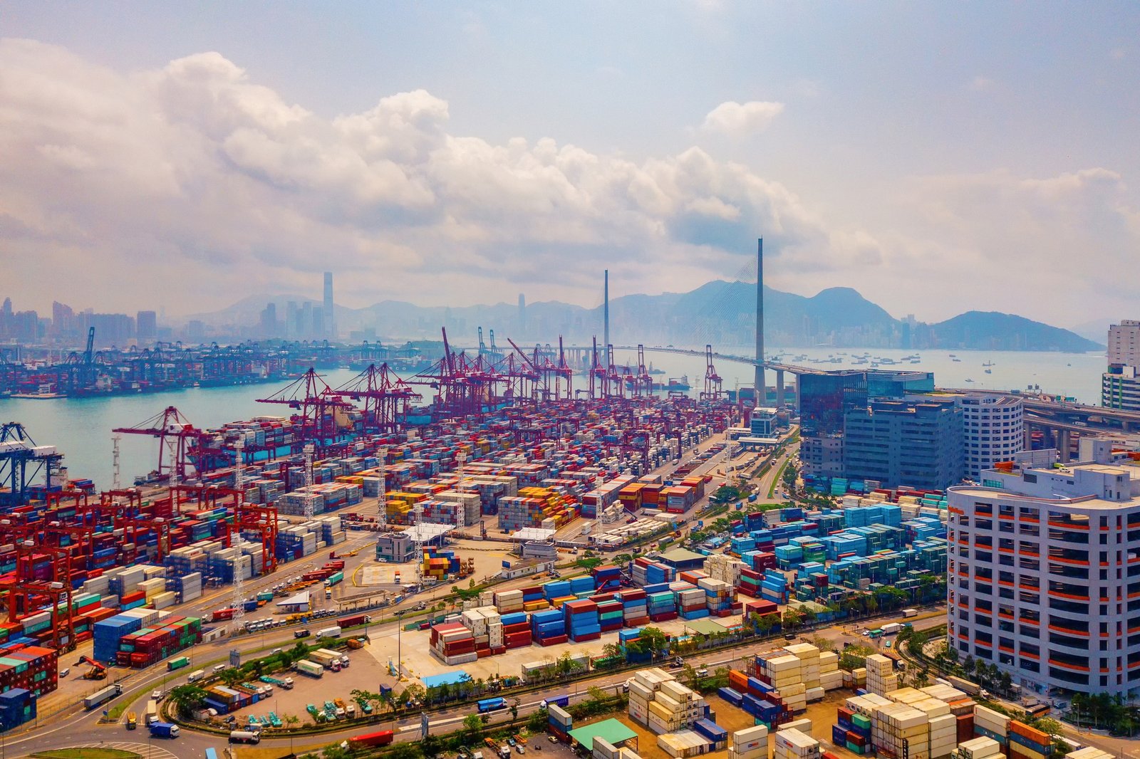 container cargo ship in the export and import business and logistics. Shipping to the harbor